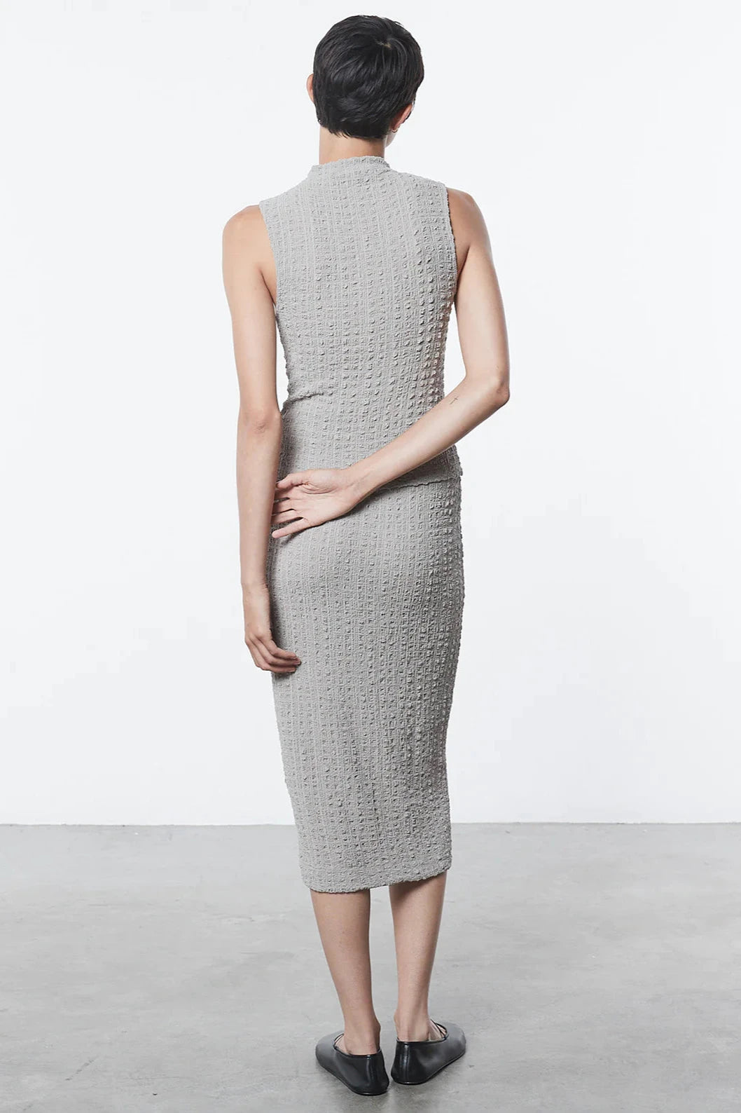 Puckered Sleeveless Hi-Neck